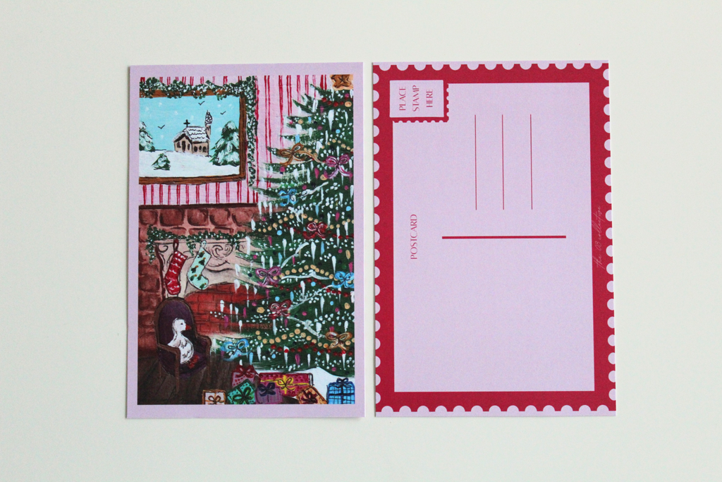 Postcard with an illustration of a duck sitting in a chair beside a decorated Christmas tree and presents. Pictured with the back of the postcard where a letter can be written and address lines.