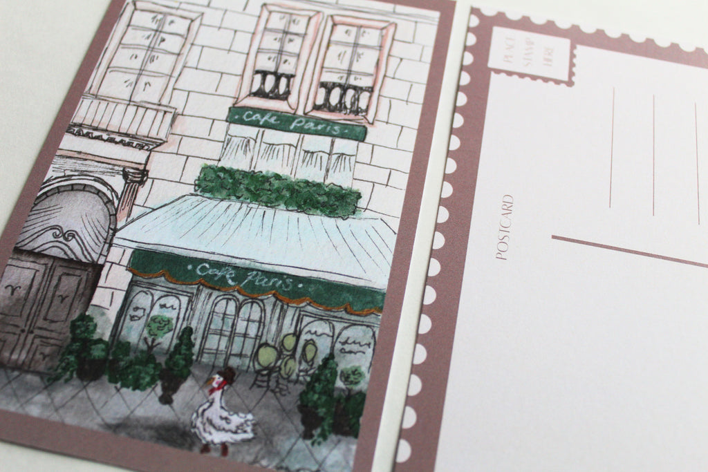 Closeup image of the front and back of the "Duck in Paris" postcard.