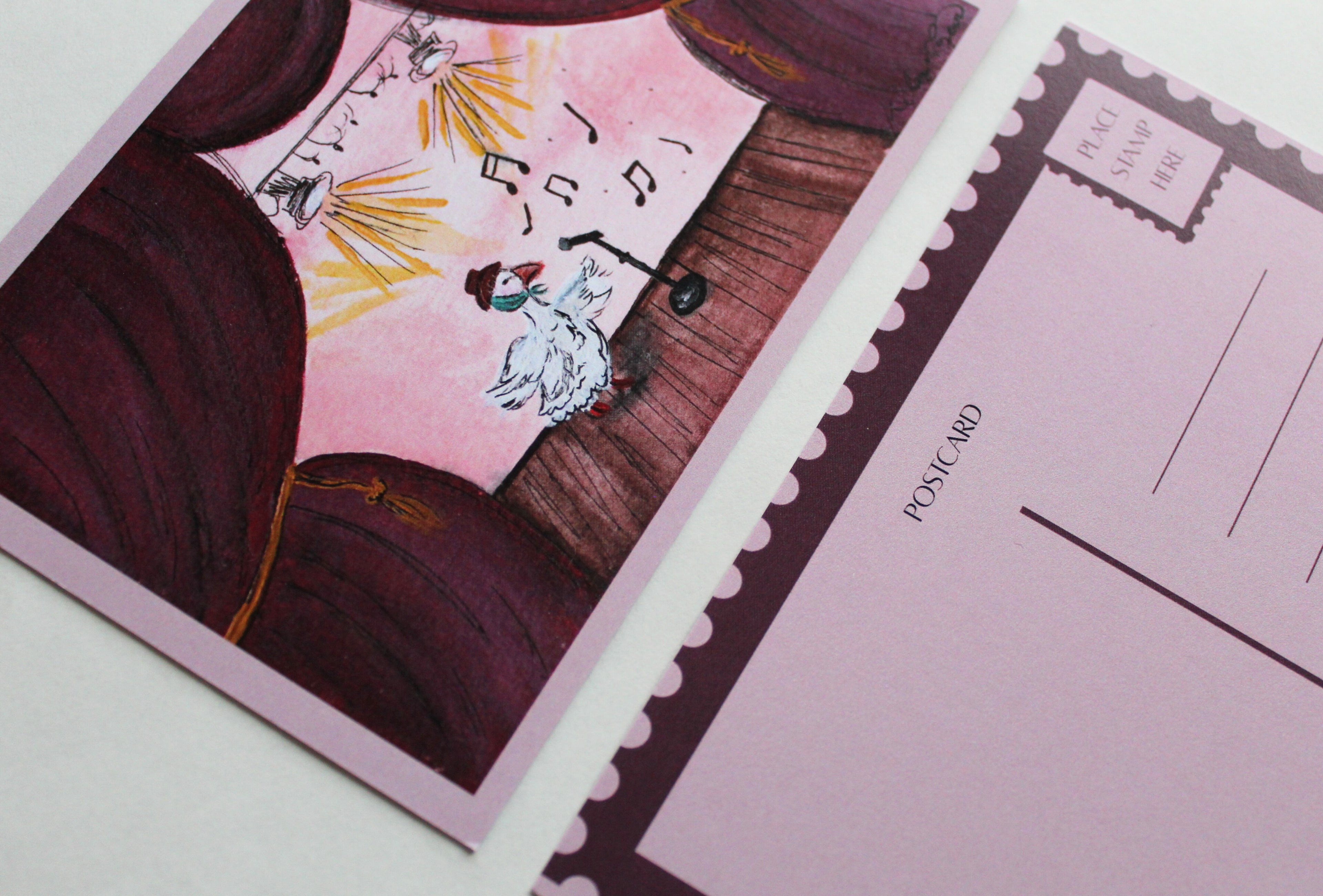 Closeup image of the front and back of the "Grammy Award Winning" postcard. 